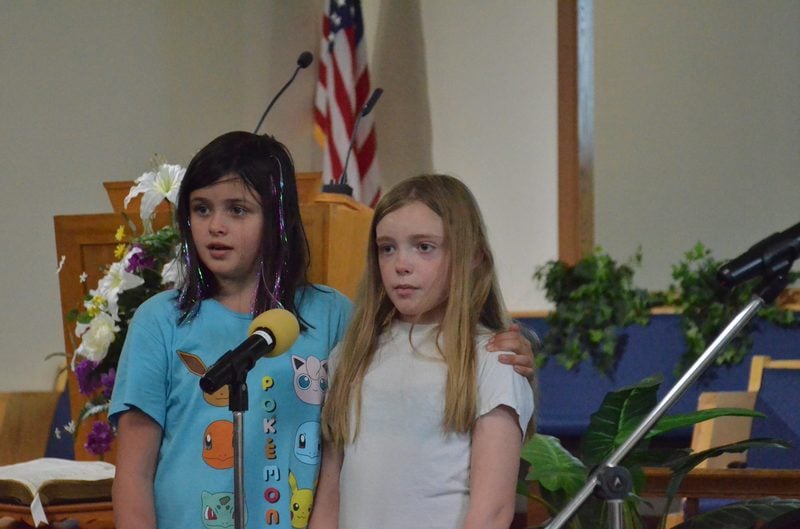 Young students singing together