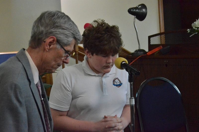 A student in prayer