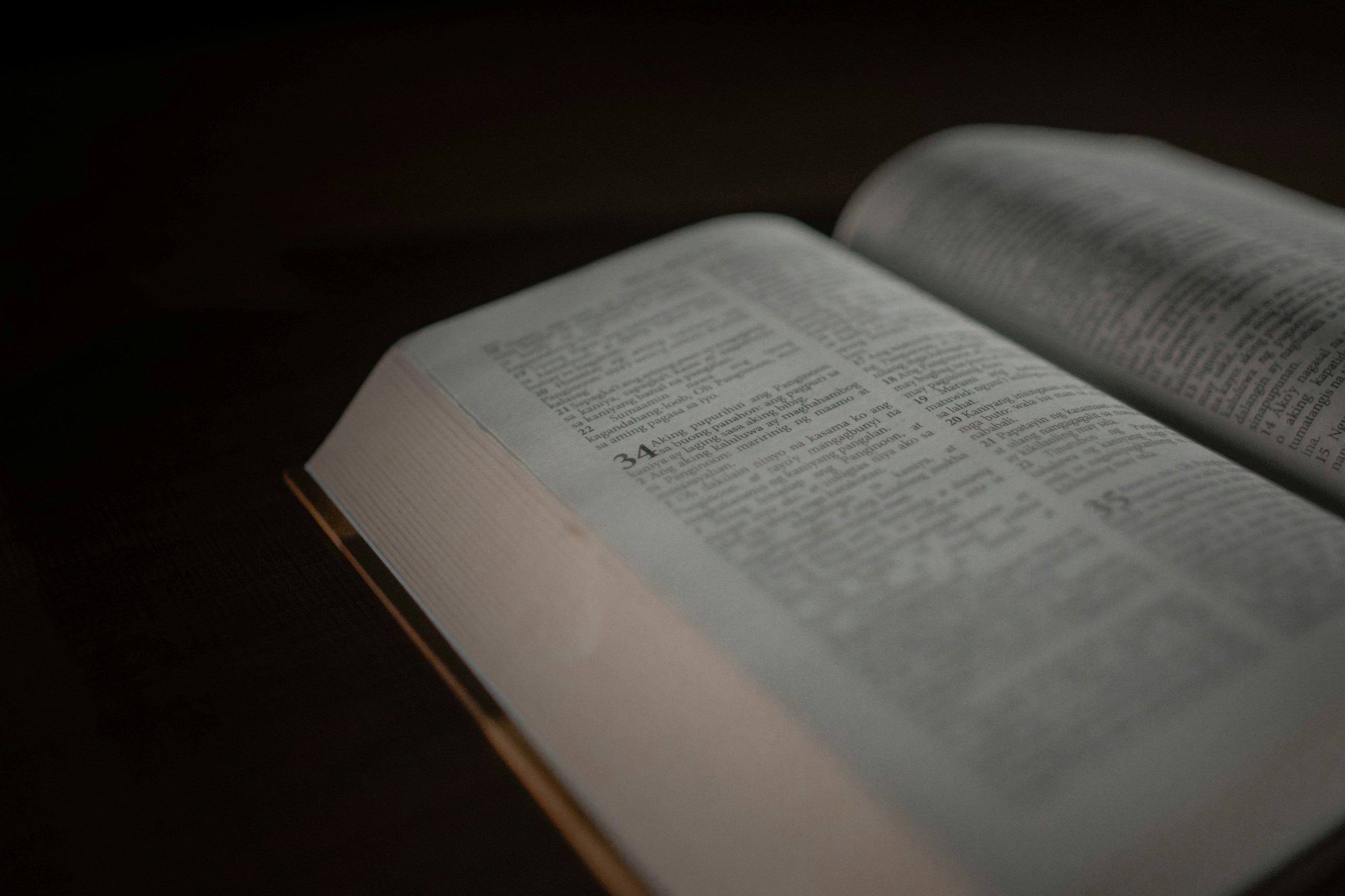 an open book sitting on top of a table