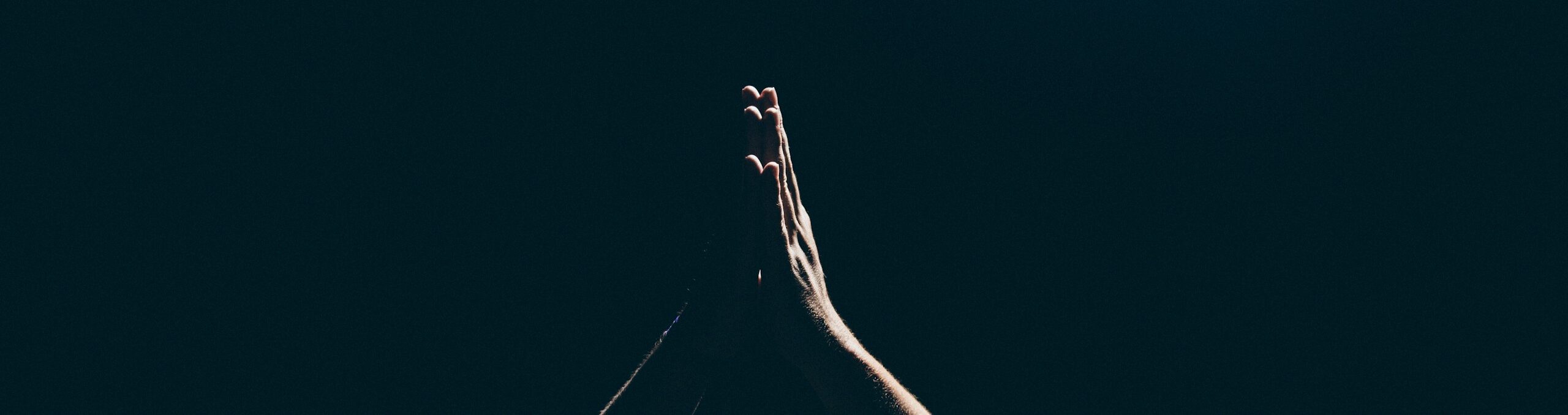 person raising arms