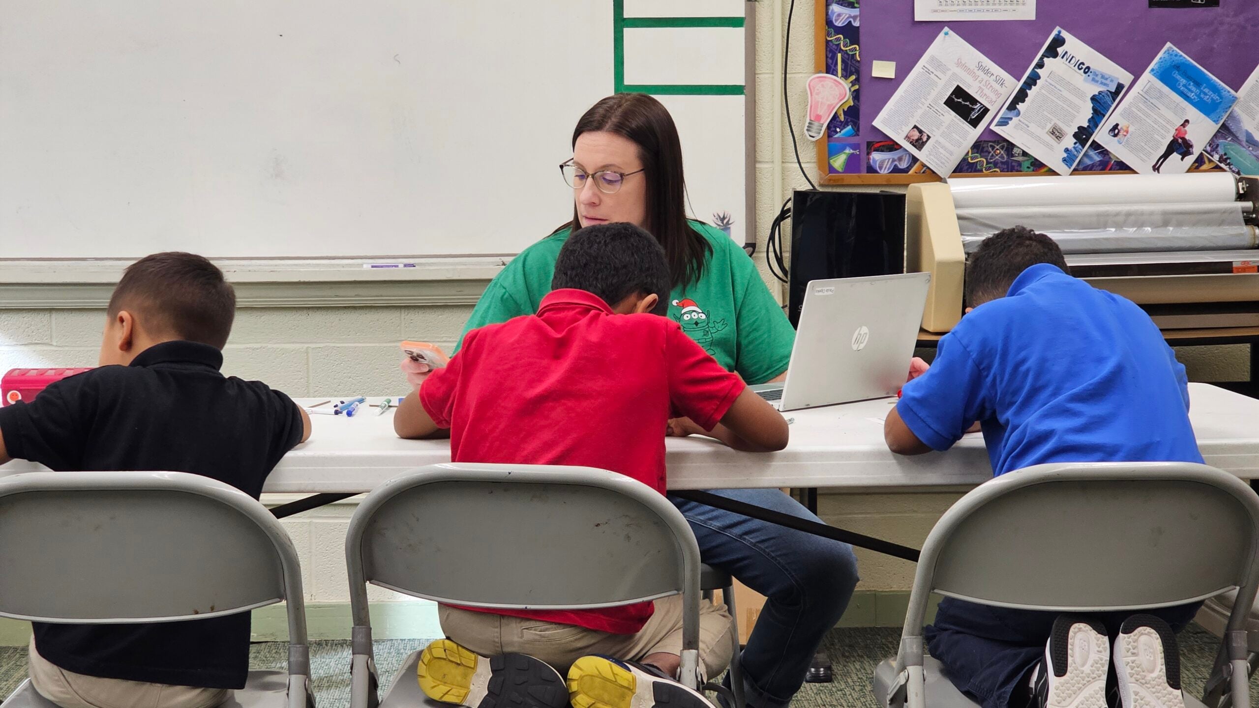 Reading Junior Academy students learning together in a small group