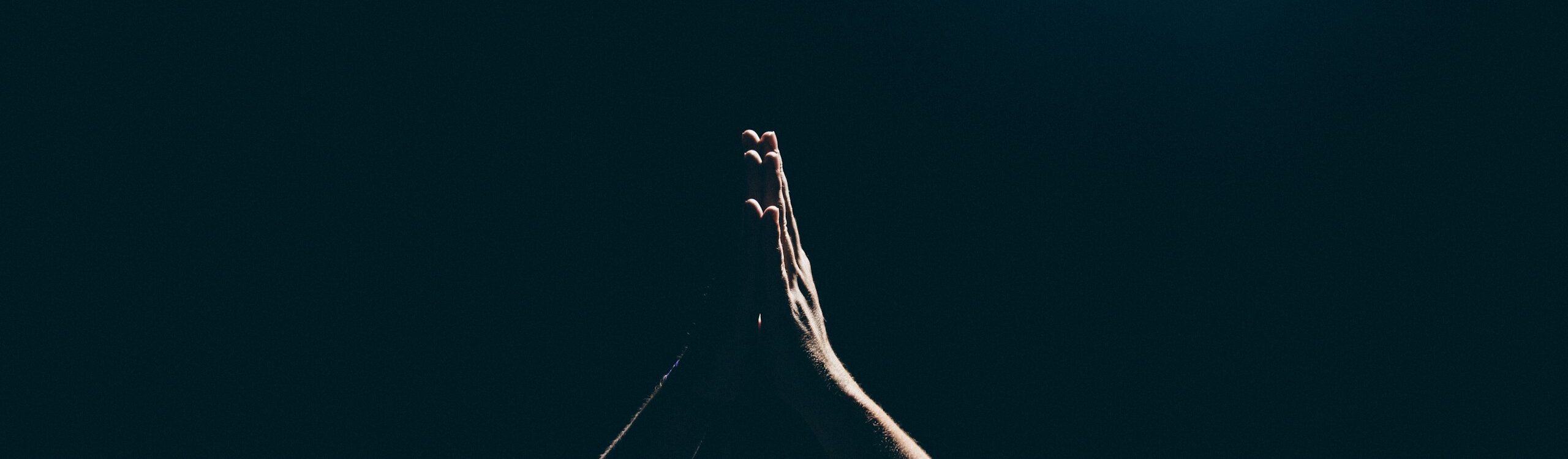 person raising arms
