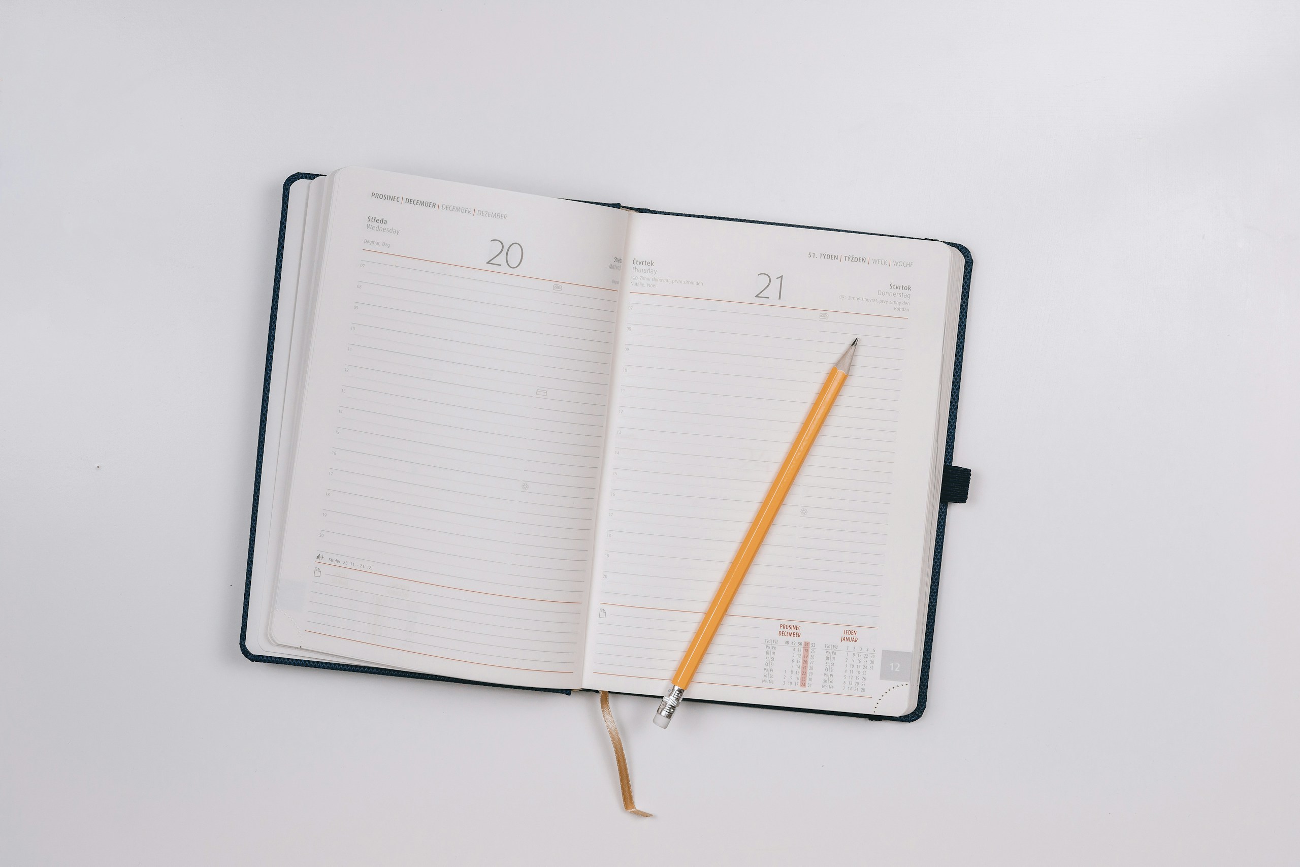 pencil on opened notebook