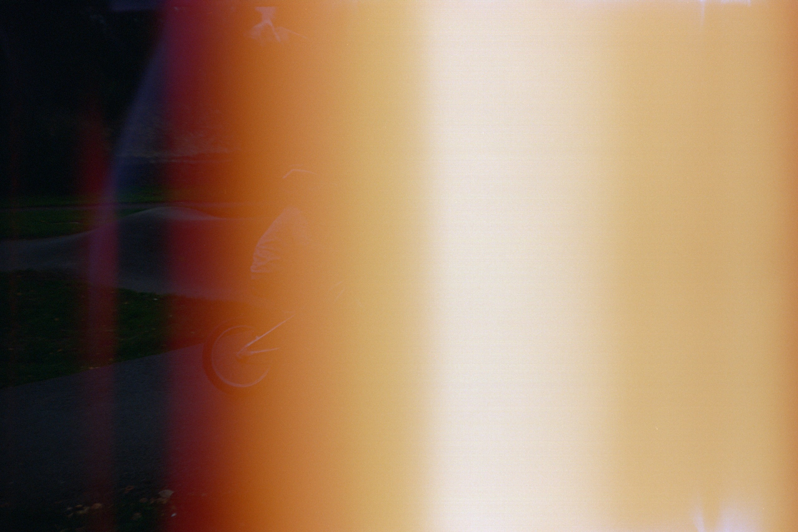 Abstract light leak with blurred background elements