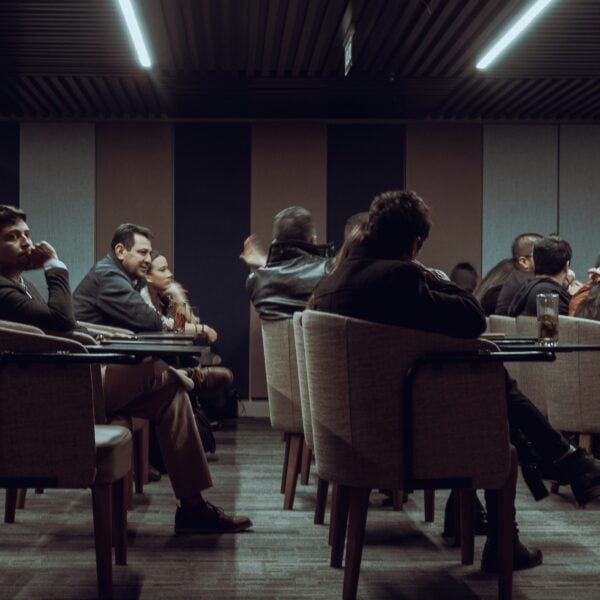 a group of people sitting at tables