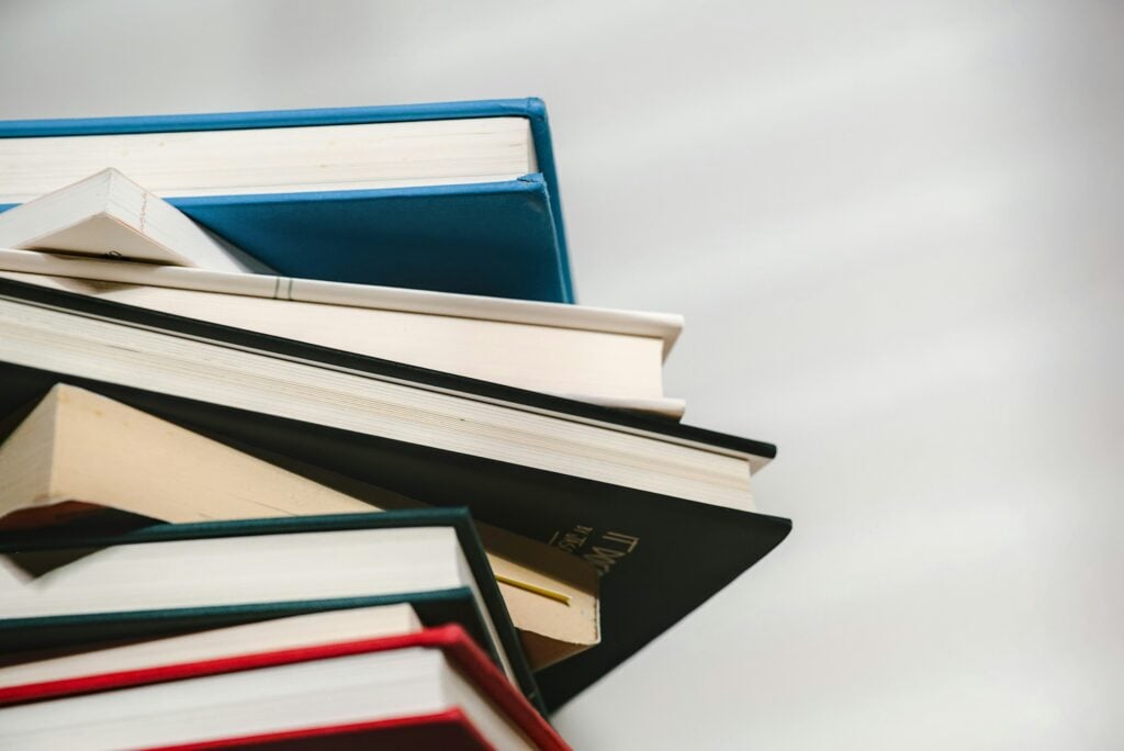 a stack of books sitting on top of each other