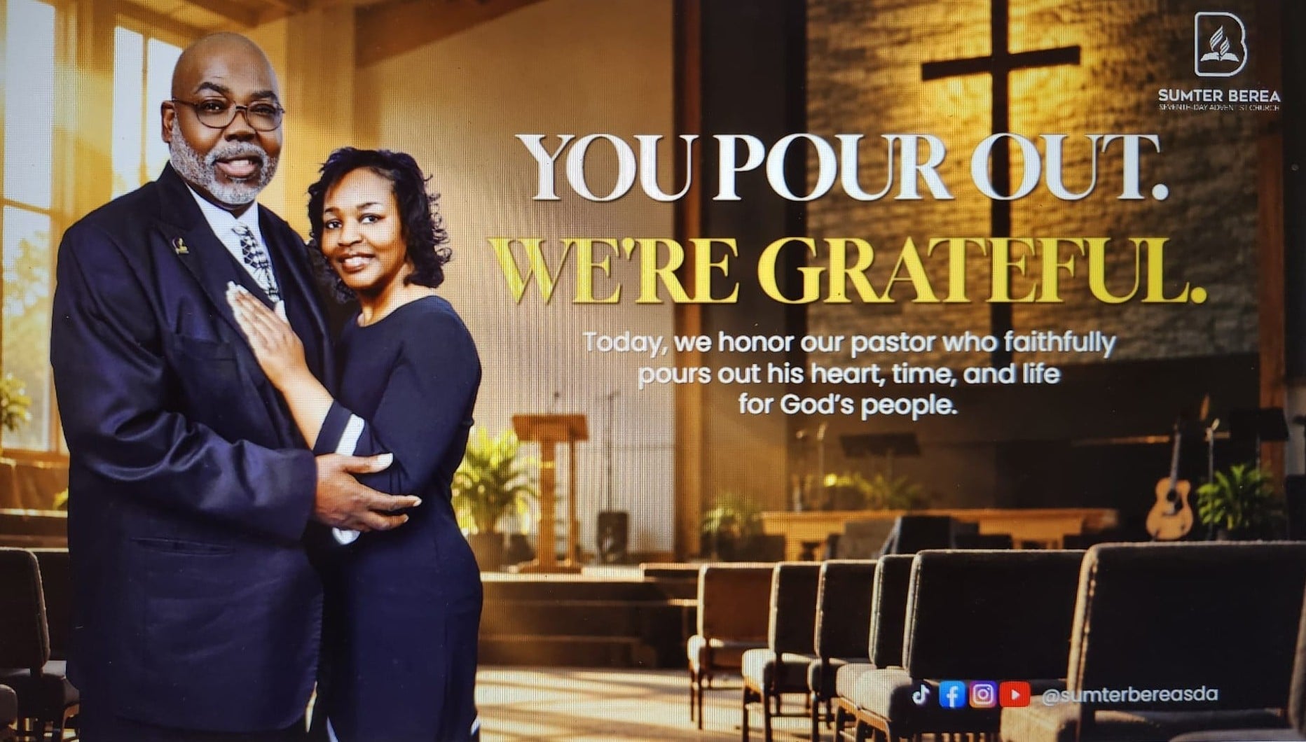 A pastor and his wife standing in a church with the text "You Pour Out, We're grateful."