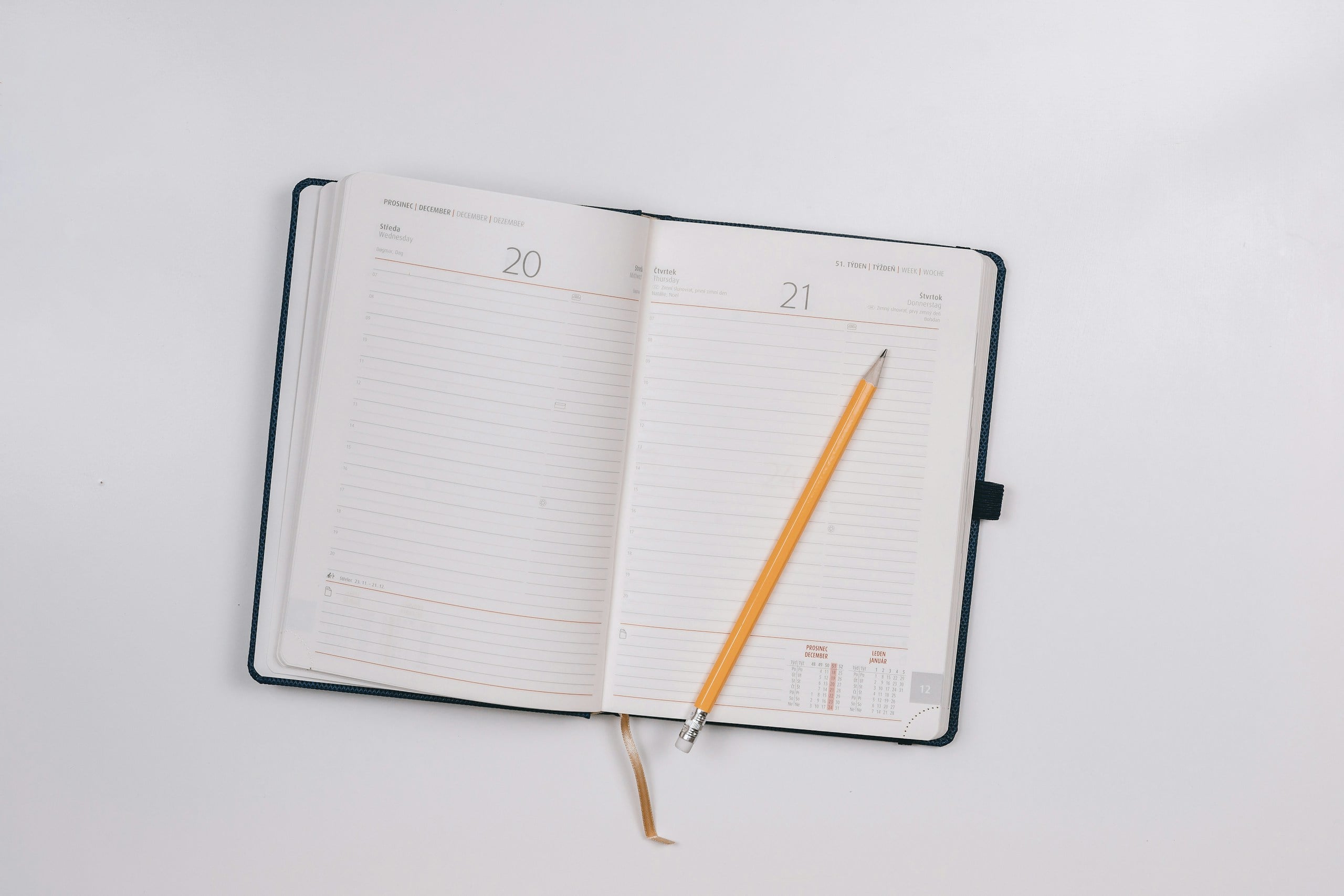 pencil on opened notebook