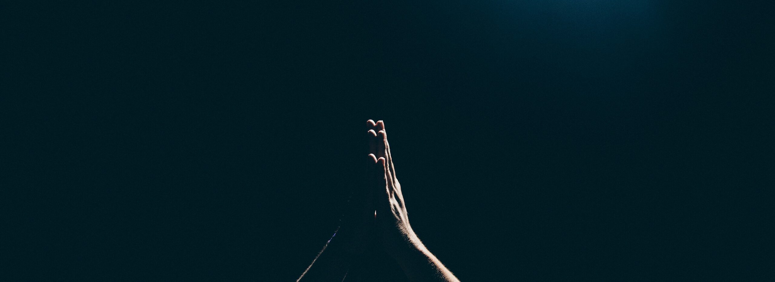 person raising arms
