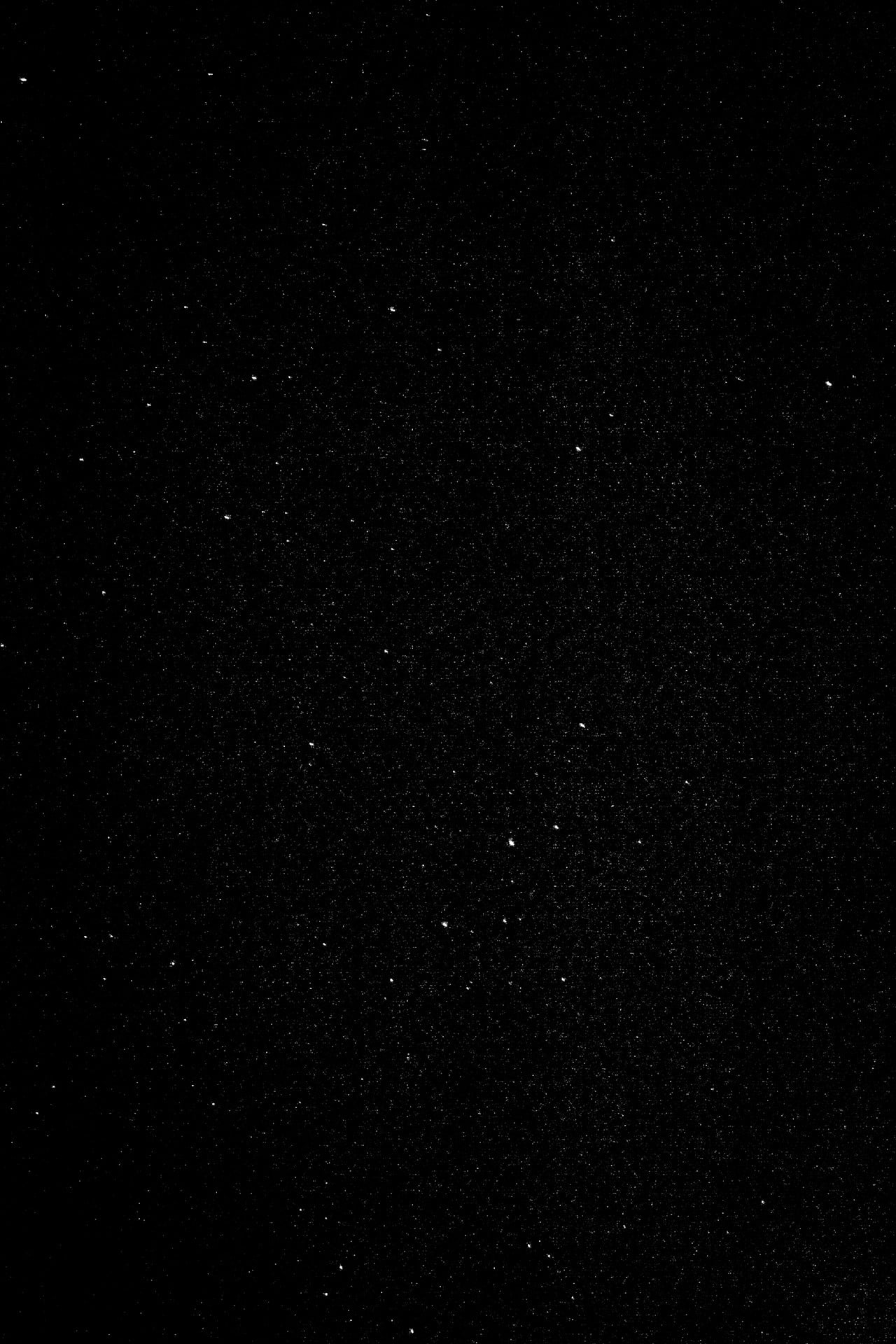 a black sky filled with lots of stars